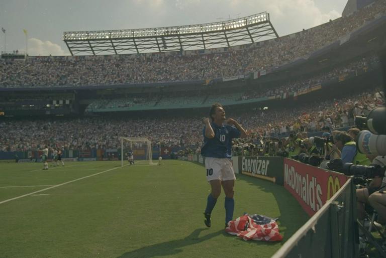 13 Jul 1994:  Robert Baggio of Italy celebrates with the crowd after scoring during the World Cup semi-final against Bulgaria at the Giants Stadium in New York, USA. Italy won the match 2-1. \ Mandatory Credit: Simon  Bruty/Allsport